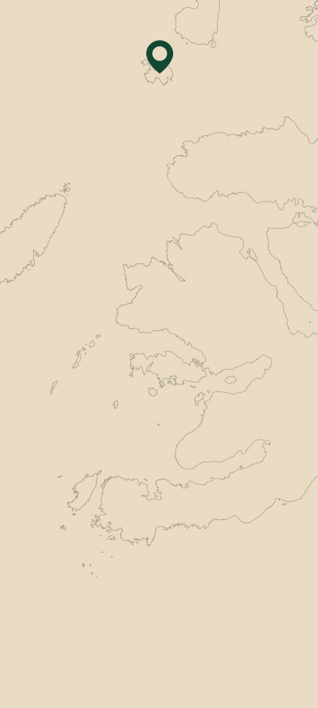 Eine Karte der schottischen Inseln auf beigefarbenem Hintergrund mit einer Standortnadel über der Isle of Muck